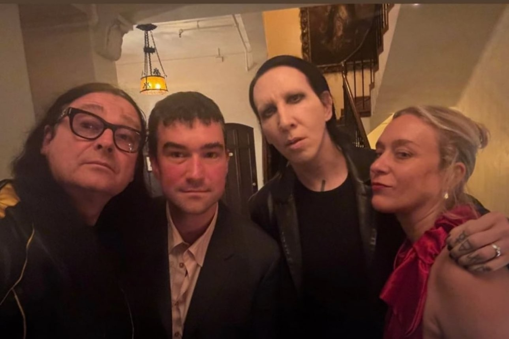 The Mosh Network - Chloë Sevigny posing for a photo with Marilyn Manson and filmmaker Jonas Åkerlund at an Emmy afterparty in September 2025.