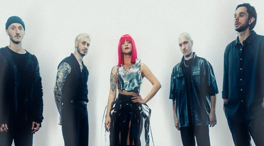Novelists Release New Songs “Coda” & “K.O.” The Mosh Network - Novelist band photo from 2024 in a white room.