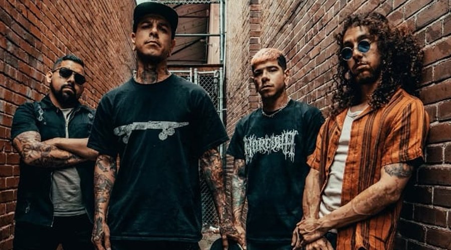 UPON A BURNING BODY Announce Early 2026 Southeastern U.S. Tour The Mosh Network - Upon A Burning Body group photo in a brick alleyway. Circa 2025