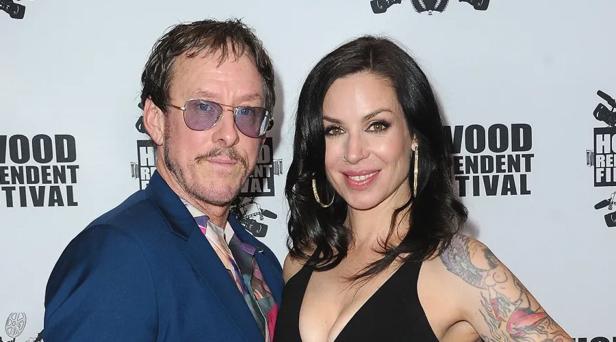 Weezer Bassist Scott Shriner’s Wife Shot in Police Standoff During L.A. Chase, Booked for Attempted Murder