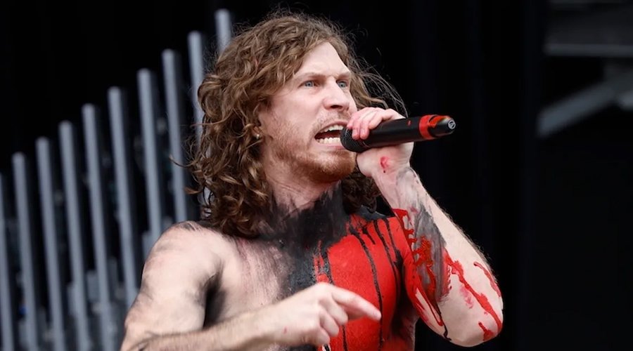 NOTHING MORE’s Jonny Hawkins Defends AI In Music: “AI Isn’t A Danger To Good Artists, Only Sh*tty Ones” The Mosh Network - Nothing More vocalist Jonny Hawkins performing live, circa 2023