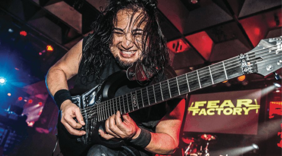 FEAR FACTORY’s Dino Cazares Addresses Rumors About Adult Film Career The Mosh Network - Fear Factory guitarist Dino Cazares playing guitar live