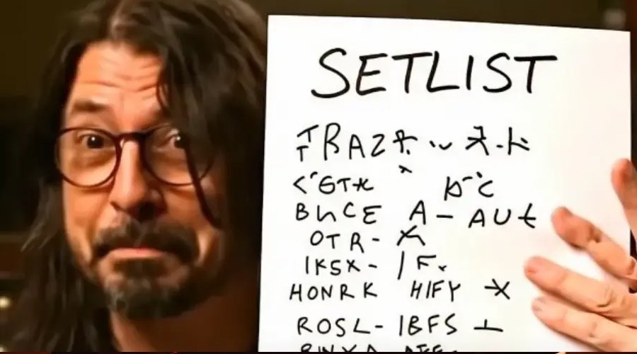 FOO FIGHTERS Share Tongue-in-Cheek AI Video While Welcoming New Drummer Ilan Rubin The Mosh Network - Foo Fighters frontman Dave Grohl holds up an AI generated set list