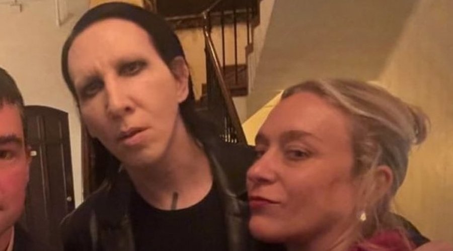 Actress Chloë Sevigny Responds To Backlash Over Emmy Afterparty Photo With Marilyn Manson The Mosh Network - Chloë Sevigny posing for a photo with Marilyn Manson and filmmaker Jonas Åkerlund at an Emmy afterparty in September 2025.