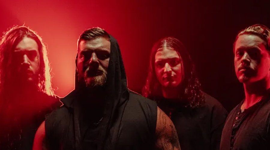 SYNESTIA Release Video for Title Track of ‘Premonitions’ EP The Mosh Network - Synestia band promotional photo with red lit background 2025