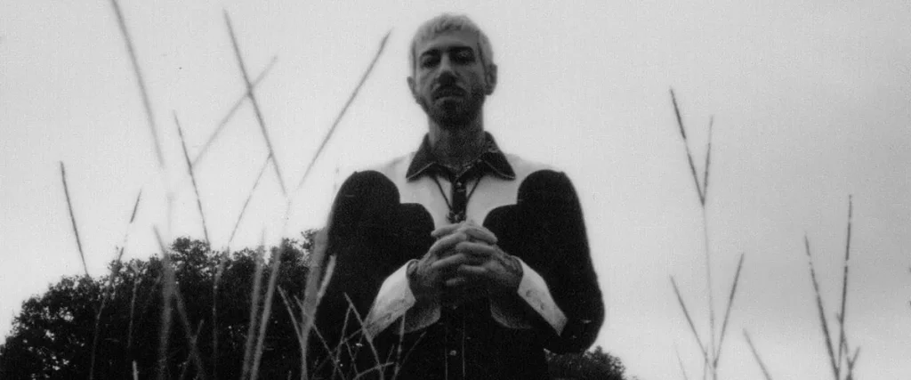 Avenged Sevenfold’s Zacky Vengeance Ventures Into Country With Solo Debut “Dark Horse” The Mosh Network - Avenged Sevenfold's Zacky Vengeance's promo photo for his country solo work under his real name, Zachary Baker - 2025