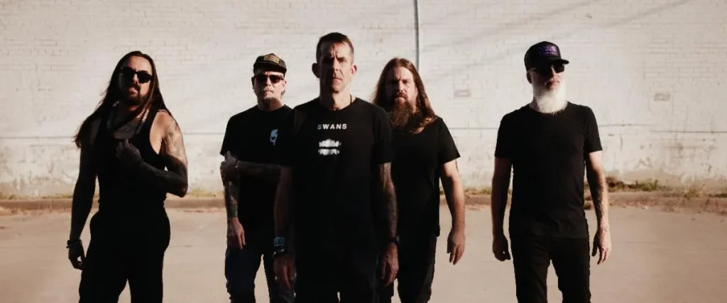 Lamb Of God Vocalist Randy Blythe Explains Logo Update — “We Didn’t Expect To Look Like A Falafel Restaurant Menu” The Mosh Network - Lamb Of God promo photo 2026