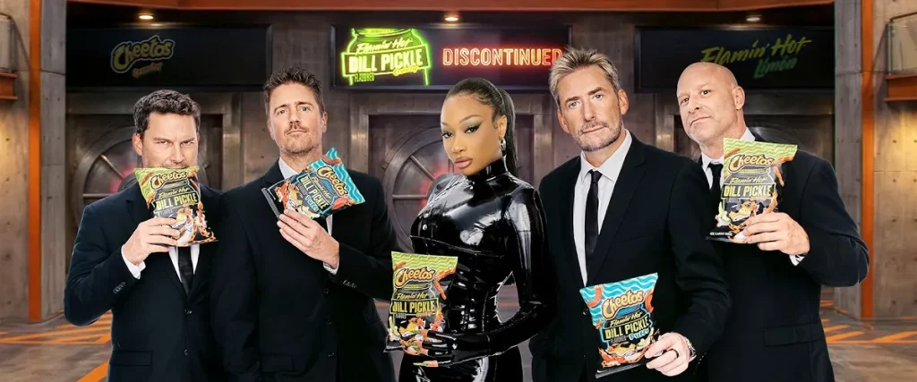 Nickelback and Megan Thee Stallion Reimagine “How You Remind Me” for Flamin’ Hot Dill Pickle Cheetos The Mosh Network - Nickelback with Megan Thee Stallion for a collaboration for Flamin' Hot Dill Pickle Cheetos