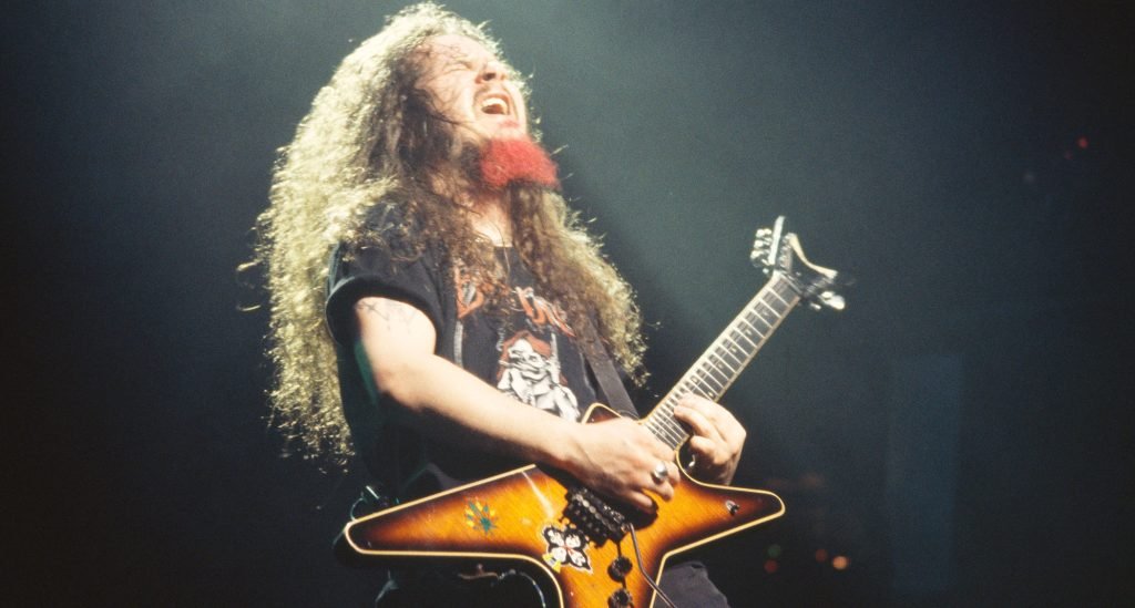 Court Sides Largely With Armadillo Distribution Enterprises In Dimebag Darrell/Dean Guitars Legal Fight The Mosh Network - "Dimebag" Darrell Abbot playing his signature Dean Guitar