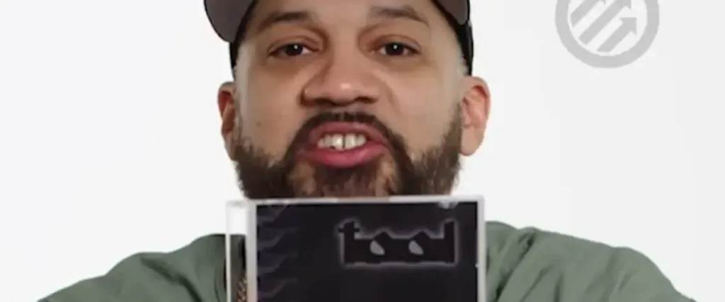 The Kid Mero Dismisses Tool’s ‘Lateralus’: “Creed And Tool Are Interchangeable In My Mind Because They’re So…” The Mosh Network - Kid Mero holding Tool's 'Lateralus'