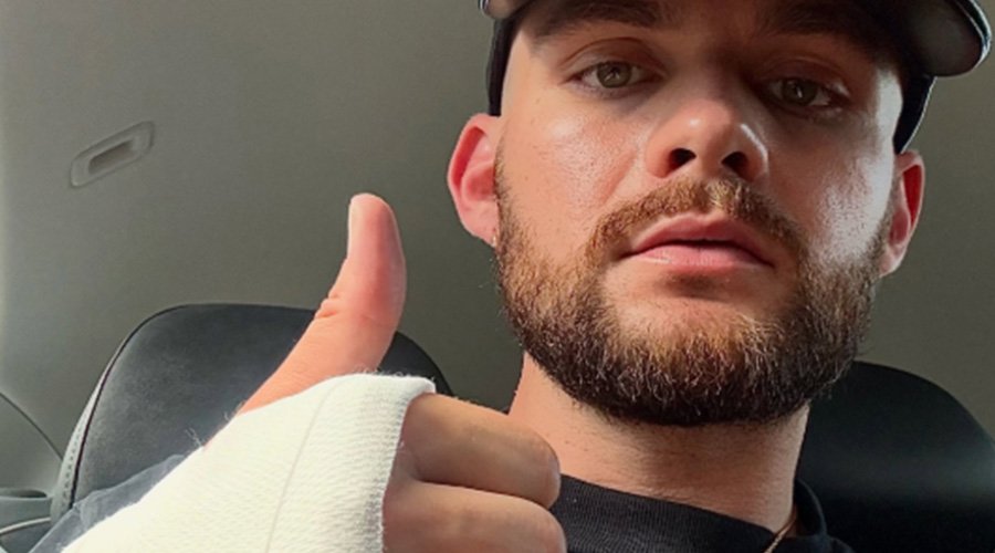 Knocked Loose Soldier On Despite Bell’s Palsy Diagnosis And Tour Injury Amid Metallica European Run The Mosh Network - Knocked Loose's Isaac Hale after being hit by a car, 2026.