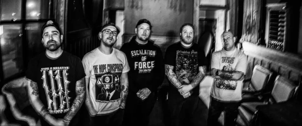 Wounded Touch Premiere “Scarlet Psalm” Video Alongside New EP ‘They Promised Eden, Vol. 2’ The Mosh Network - Wounded Touch 2026